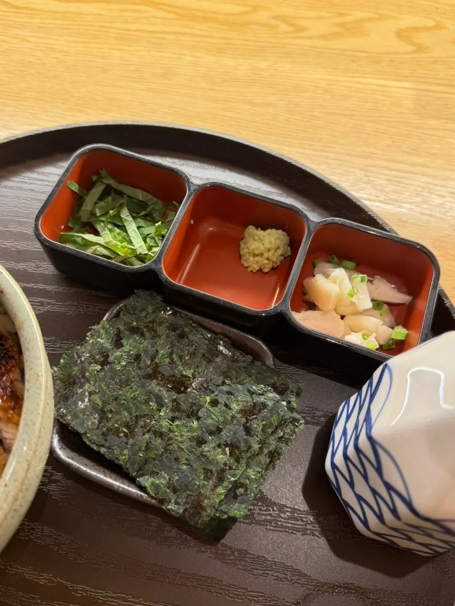 Eel and wasabi placed on a sheet of seaweed