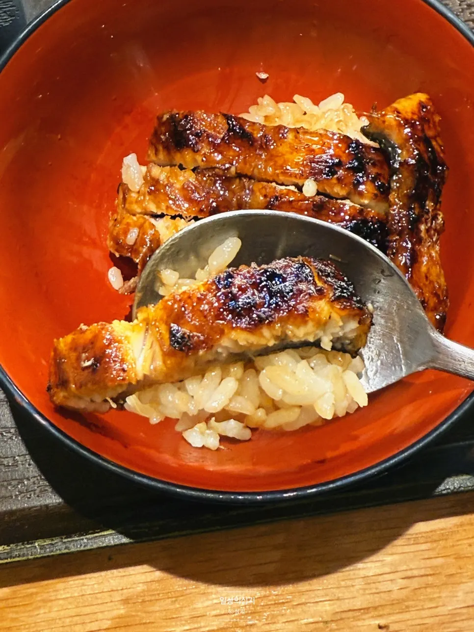 Cross-section of moist charcoal-grilled eel