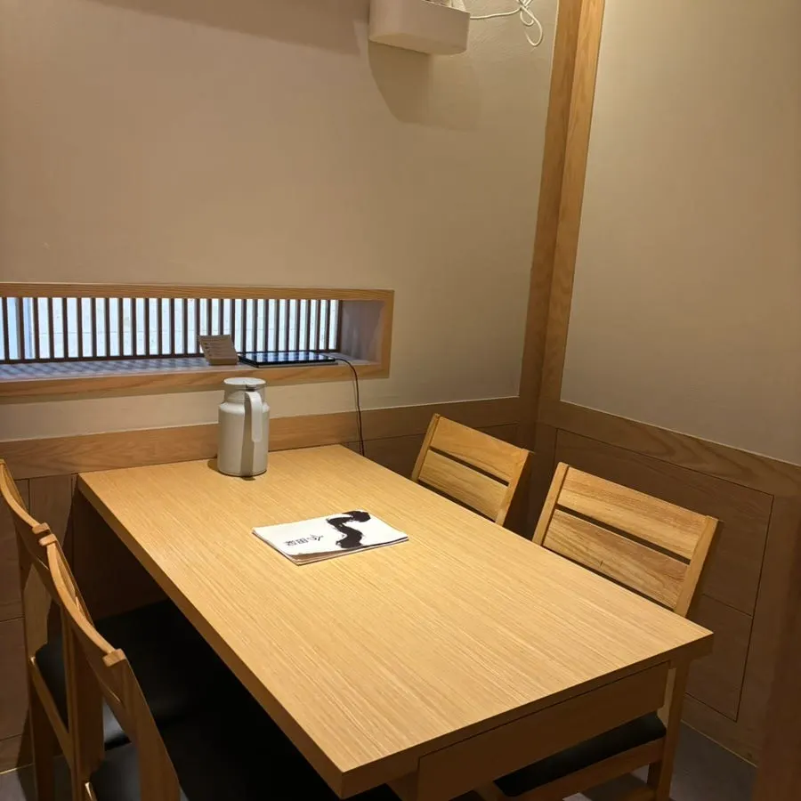 Interior of Tawa with the charcoal grill made by a Japanese craftsman