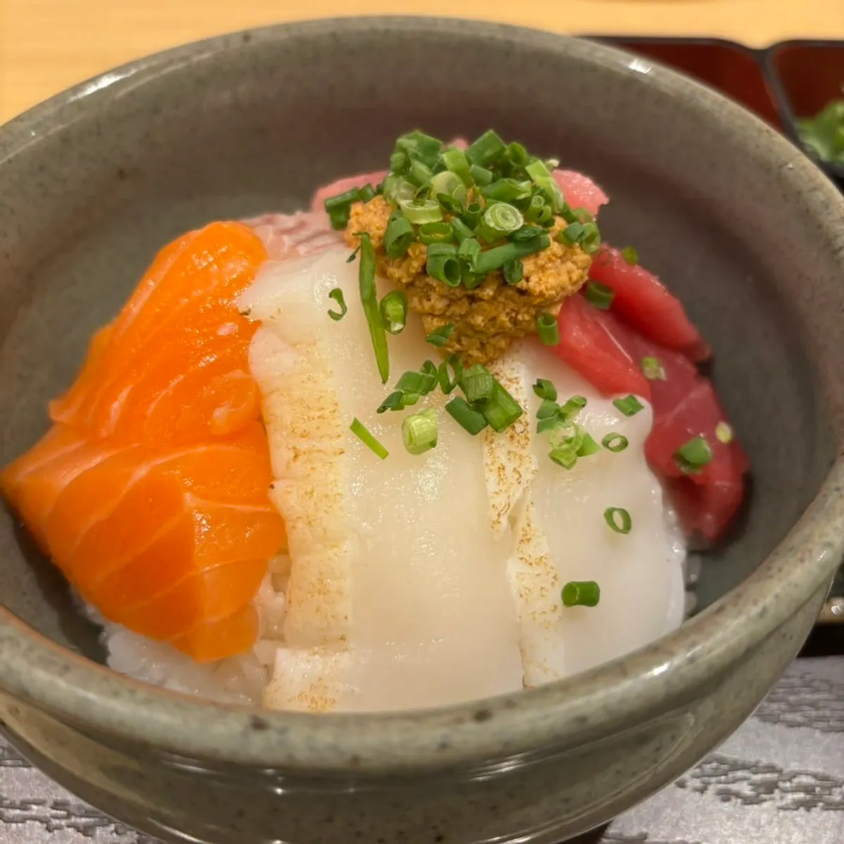 Tawa's kaisendon topped with flounder, tuna, and salmon