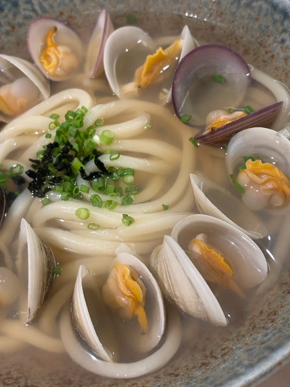 Tebo's kake udon topped with clams