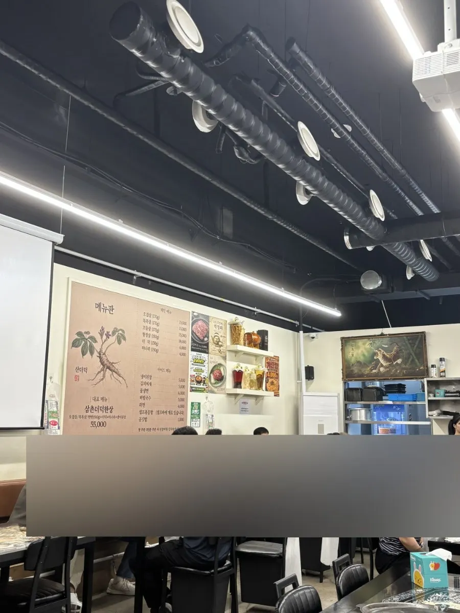 Interior of Teolbo Samchon Jip Main Branch packed with customers