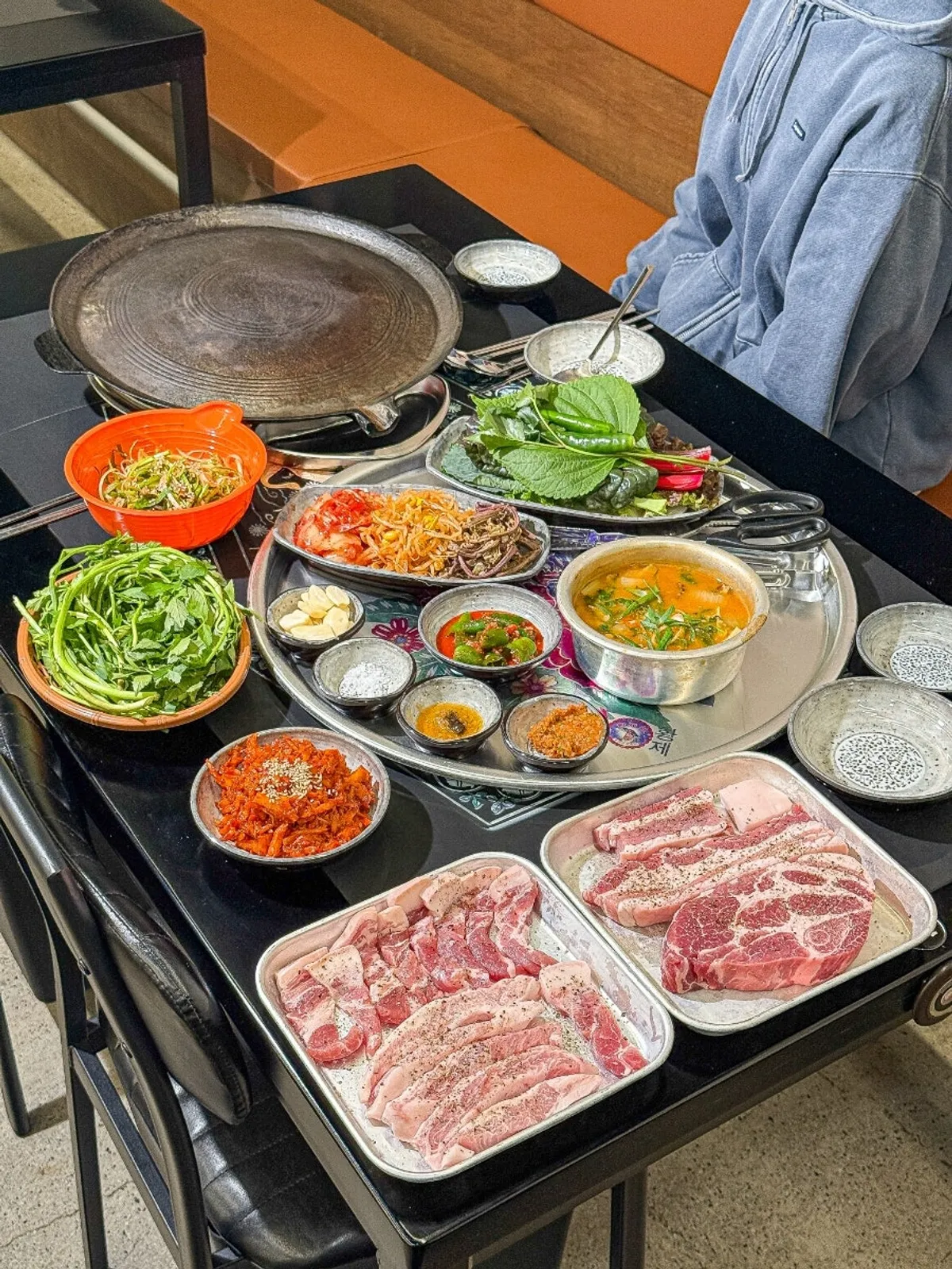 Deodeok Han-sang set with pork belly, special neck cut, deodeok grill, and minari