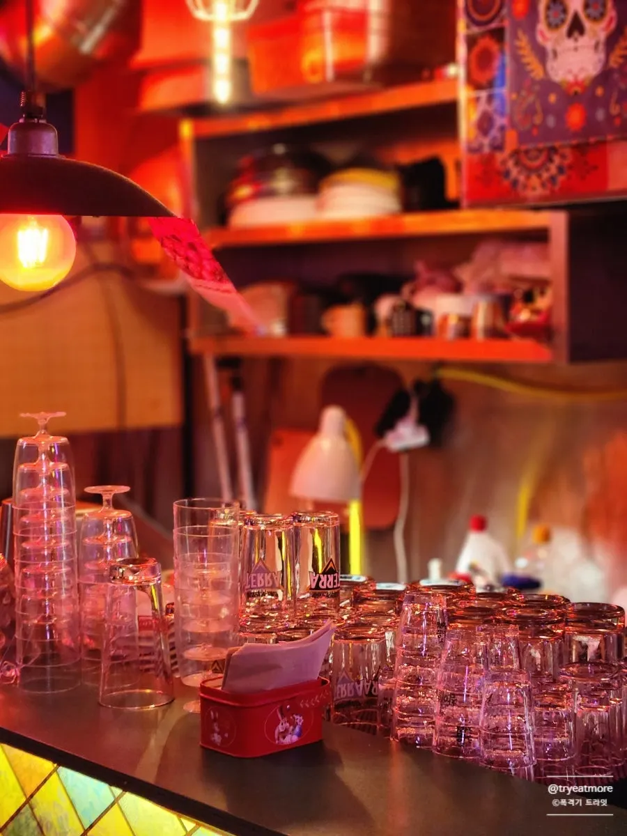 A shelf of whiskey and Korean jeongjong