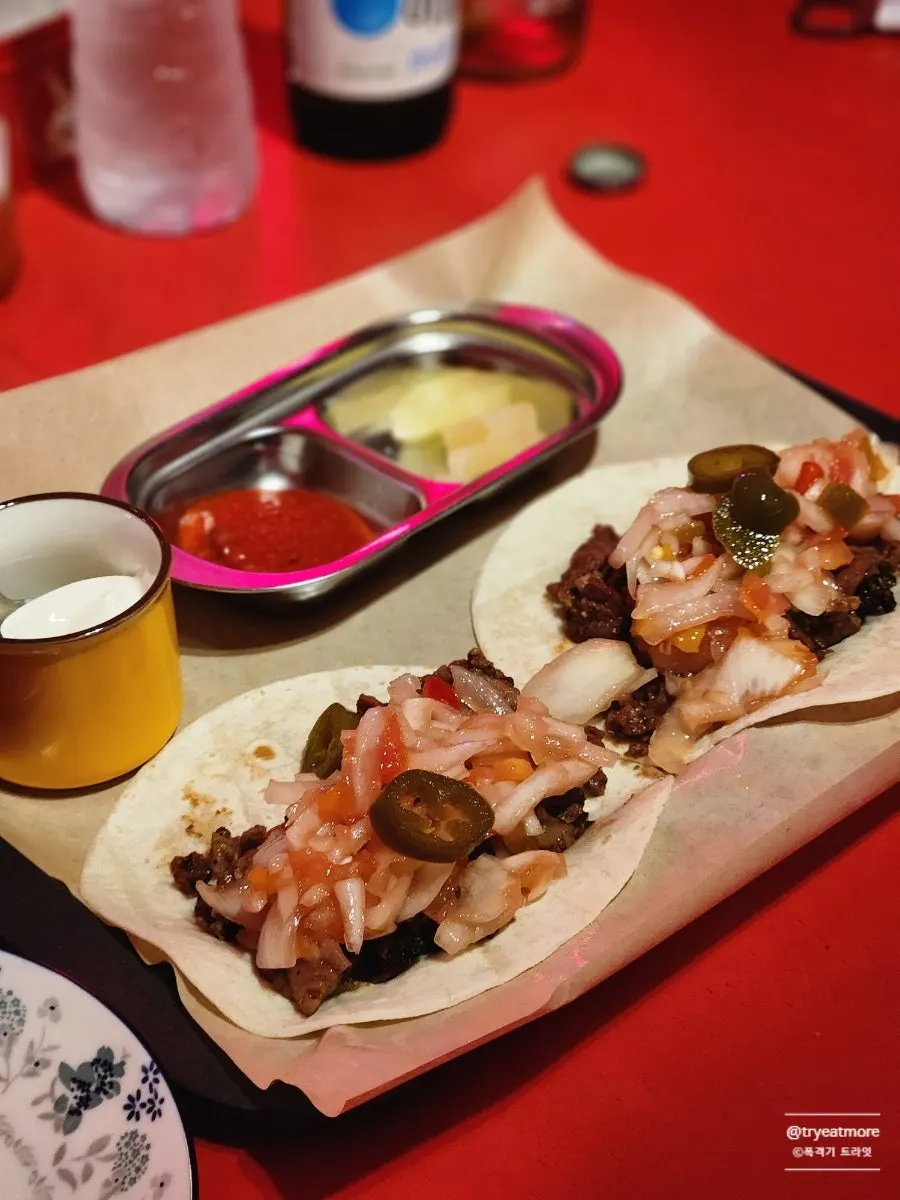 A pork taco generously stuffed with meat