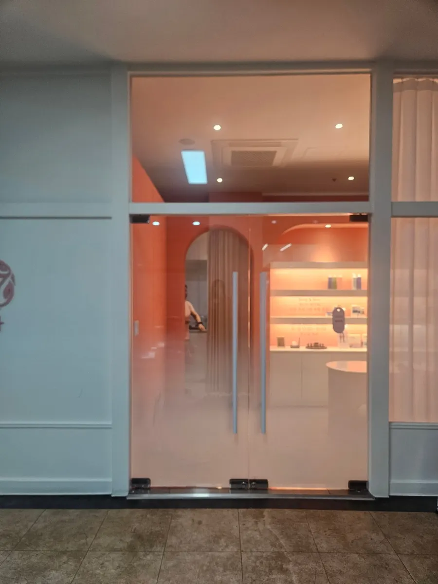 Entrance of Terra, arranged in white and coral tones
