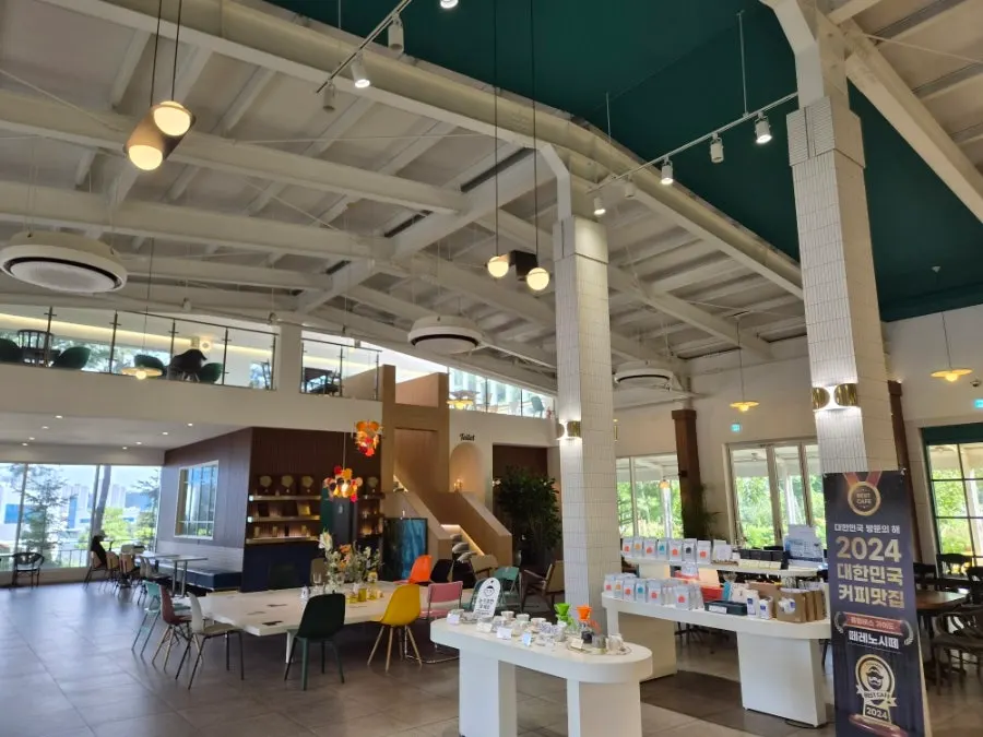 Café interior with high ceilings and divided seating