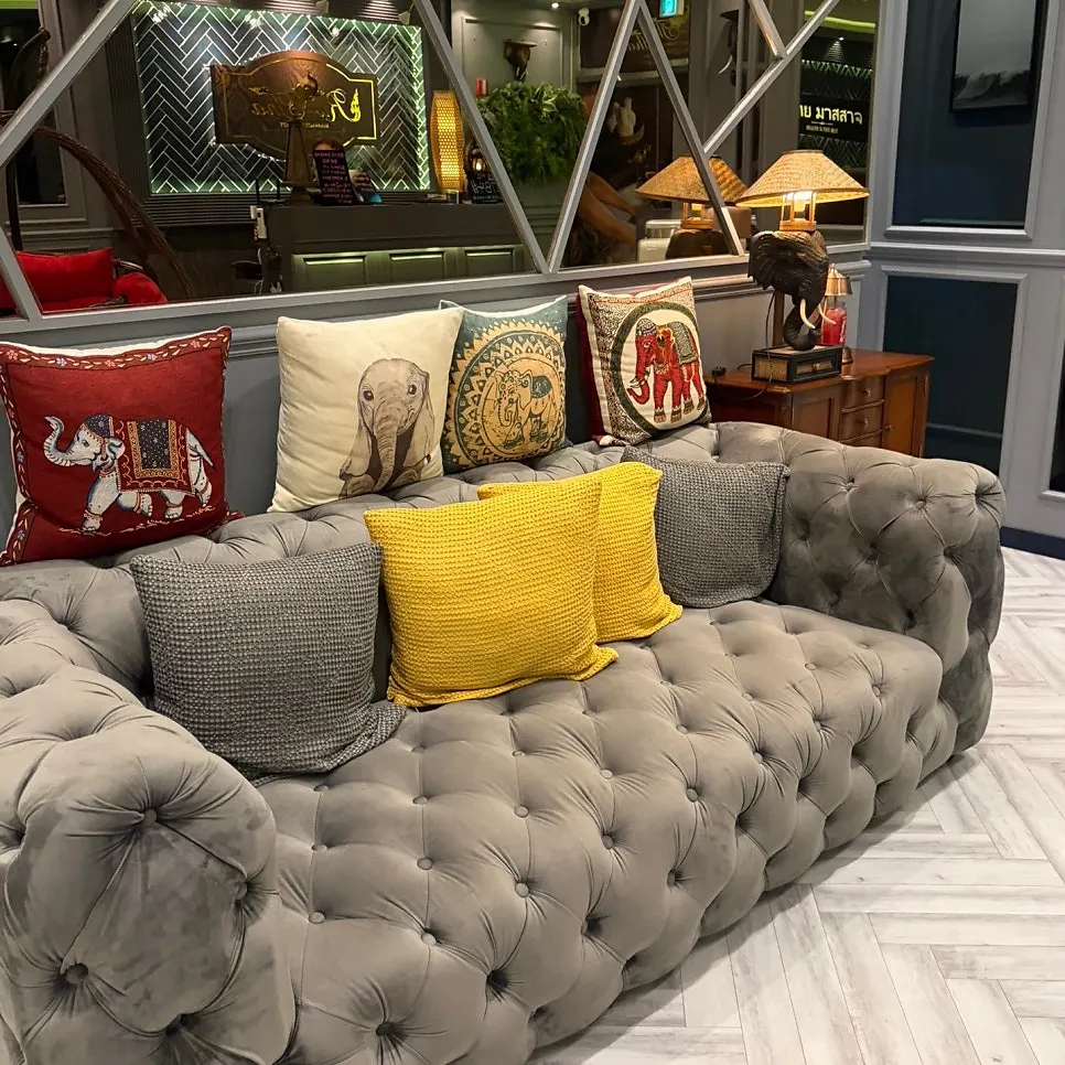 Neatly arranged waiting couch and hallway interior