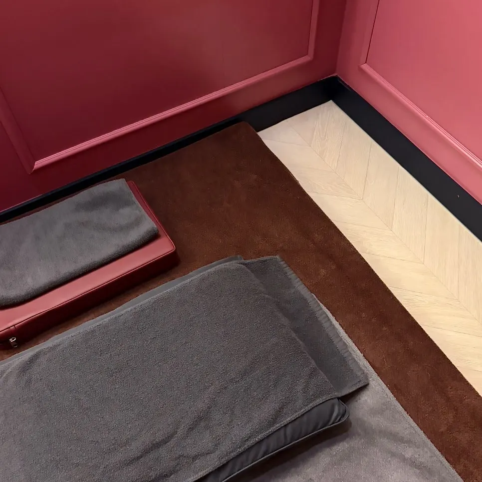 Scene of hands and arms being worked on during the massage