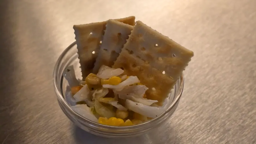 Crackers and salad served as a basic side