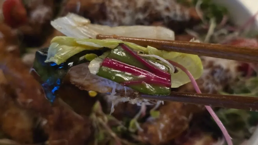 Kai phrai served with vegetables and sauce