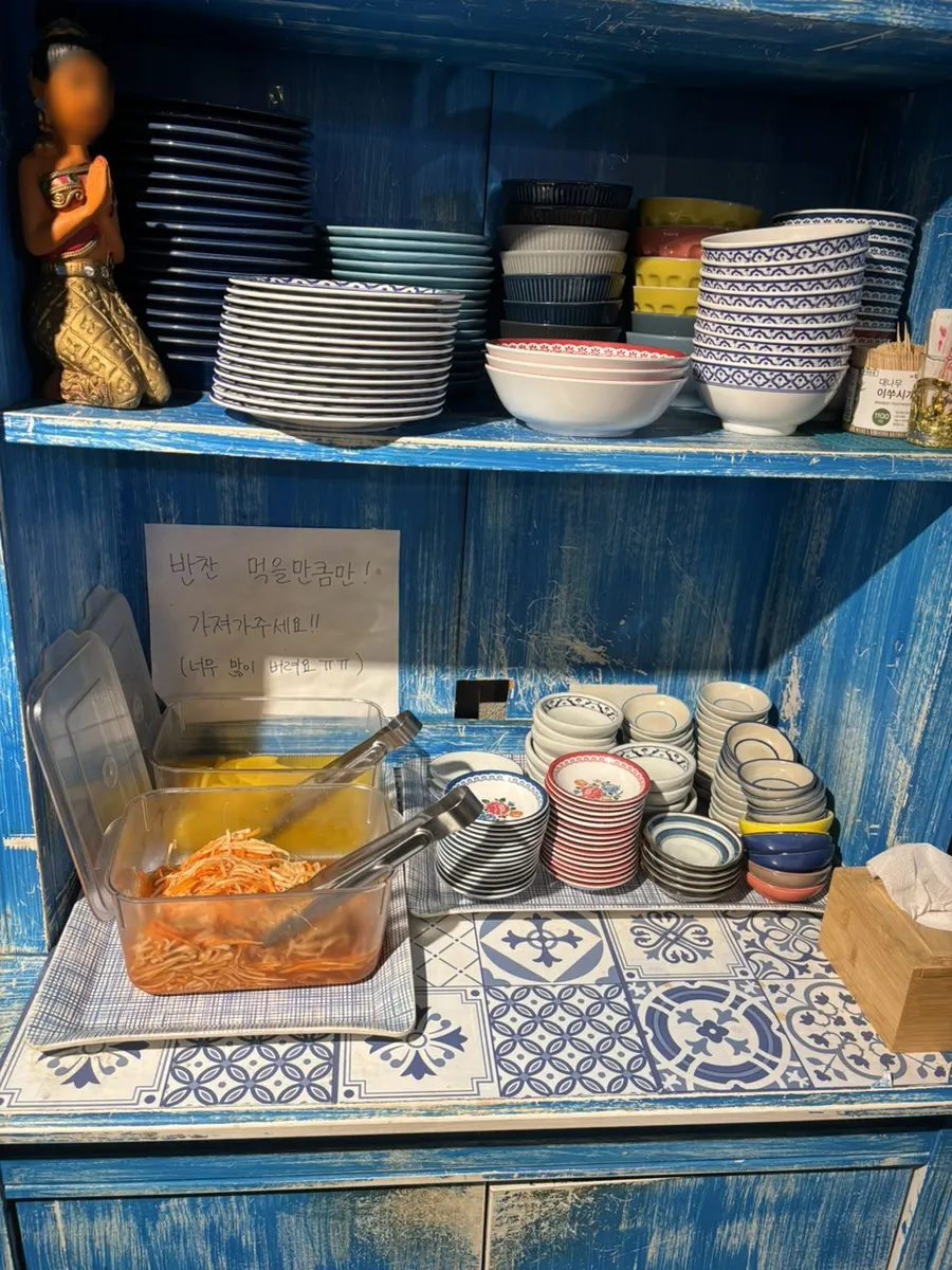 Self-serve corner at Thanon55 with som tam and pickled radish