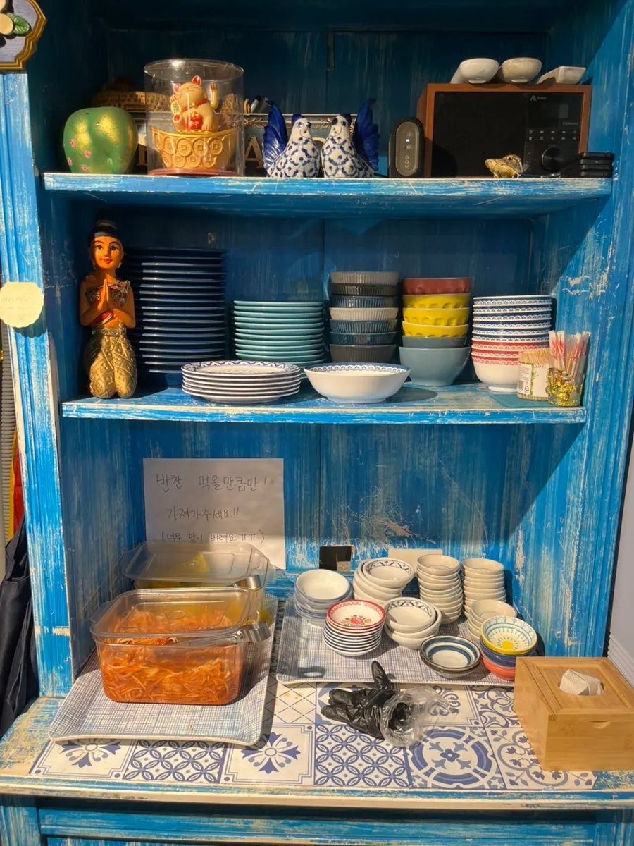 Self-serve bar at Thanon55 with small plates and side dishes