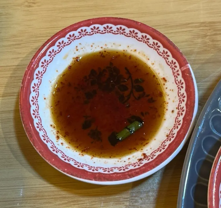 Close-up of the rice noodles and broth