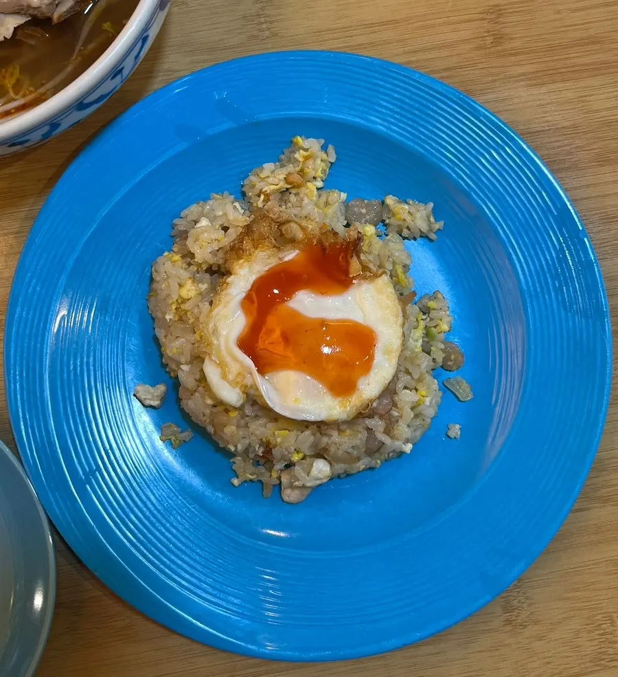 Shrimp fried rice topped with a soft-boiled fried egg