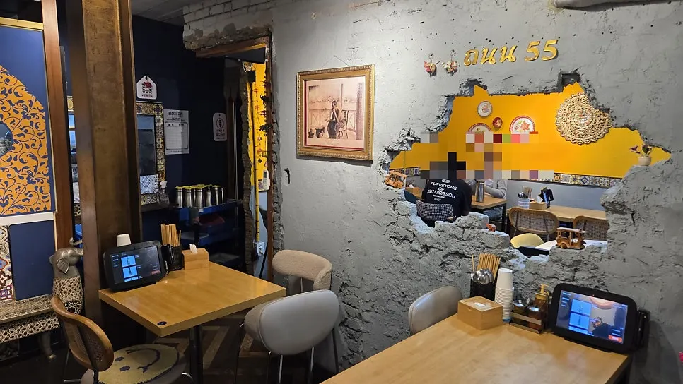 Seating and interior space inside Thanon55