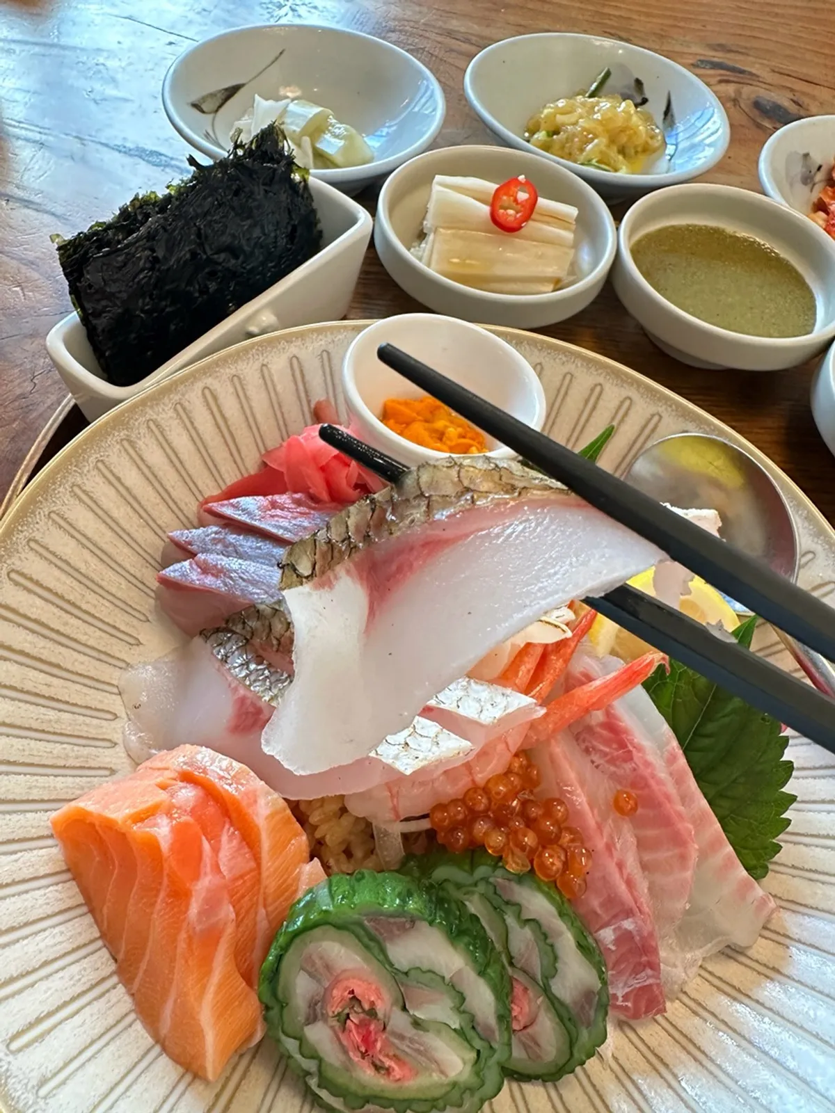 Skin-on yellowtail-family sashimi