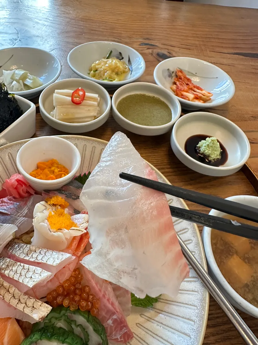 Sea bream-family sashimi served with the fin attached