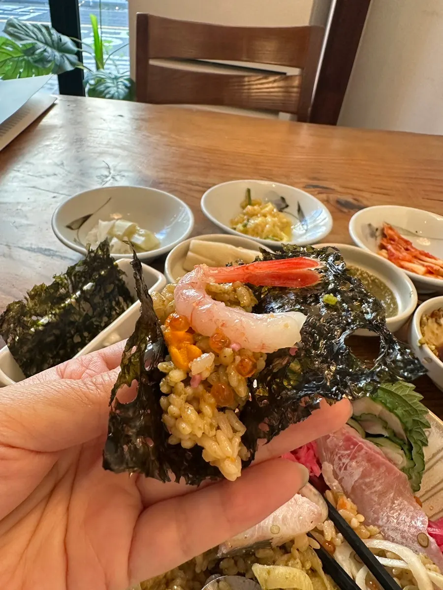 Sashimi combo wrapped in shiso leaf