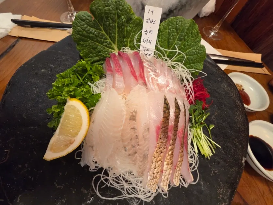 Seasonal sashimi platter with fish-name picks