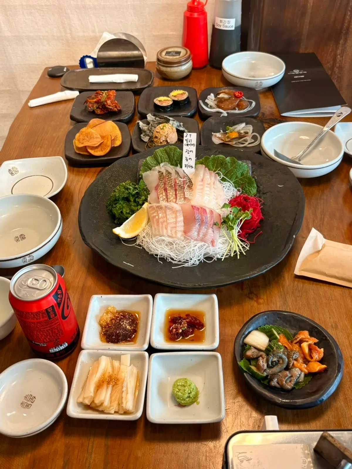 Six side dishes including seasoned crab and ankimo