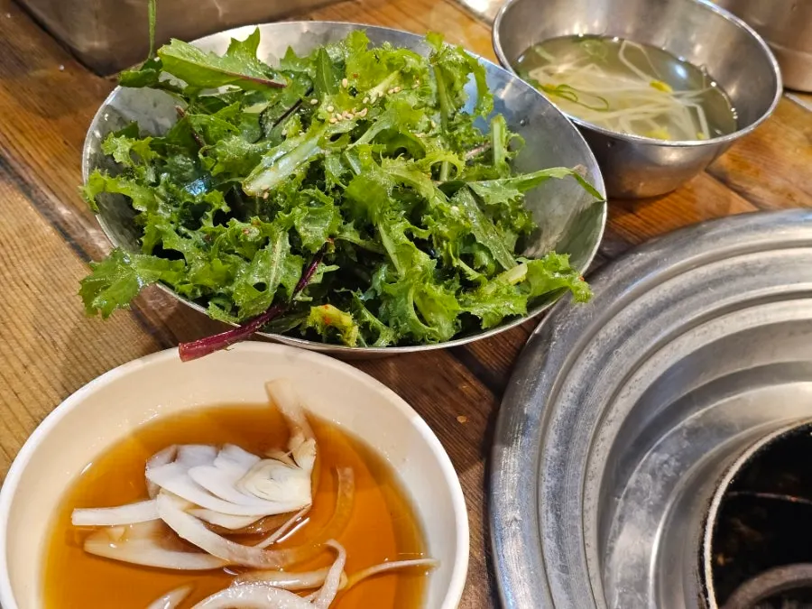 Pickled onions, pickled chicory, and various sauces