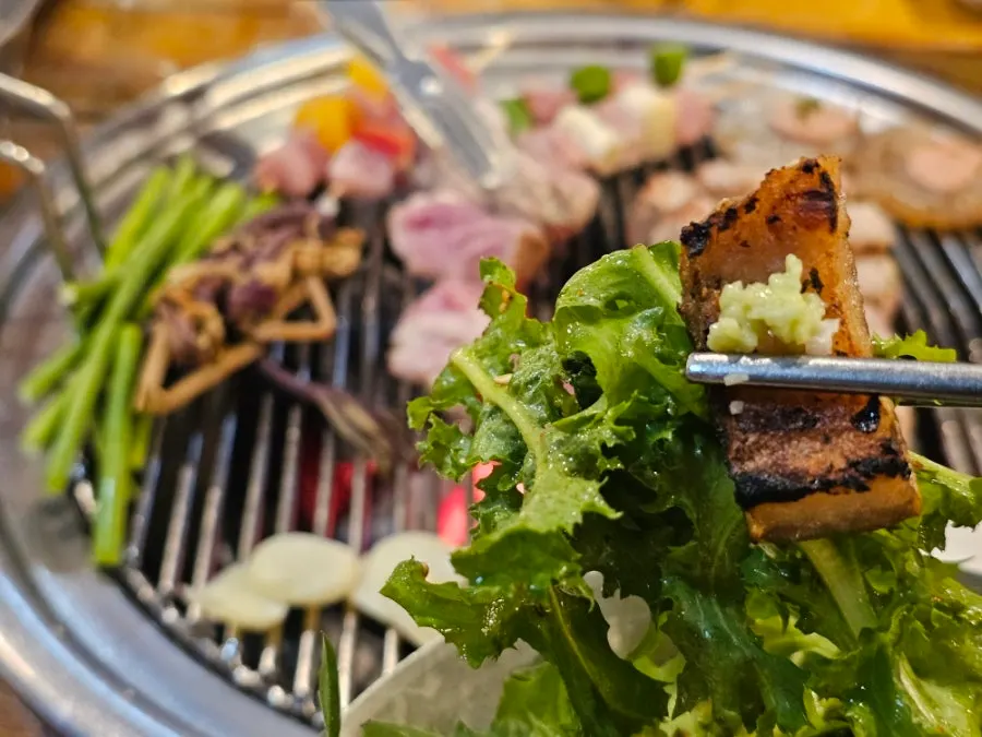 Chewy gyeopdegi cooking on the grill
