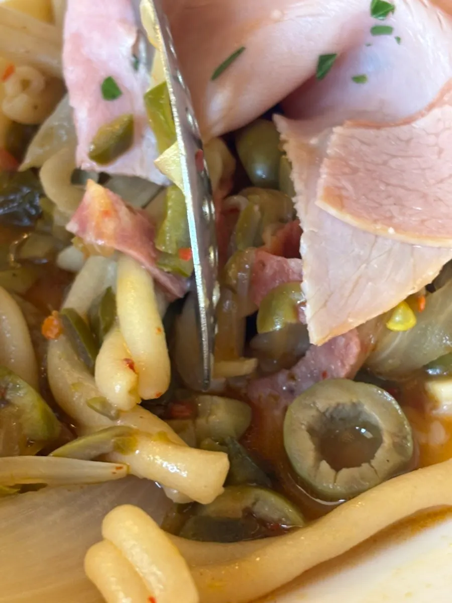 Close-up of the spicy oil-coated casarecce fresh pasta