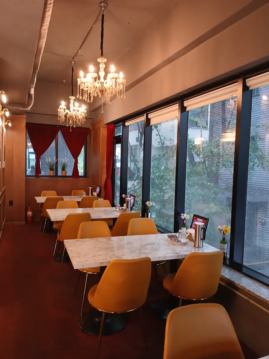 Indoor atmosphere with artwork and red carpet