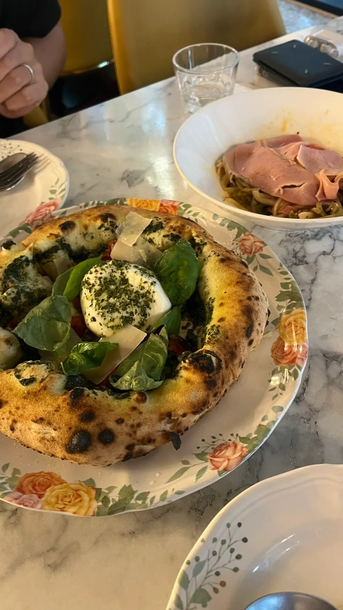 Signature basil burrata cheese wood-fired pizza