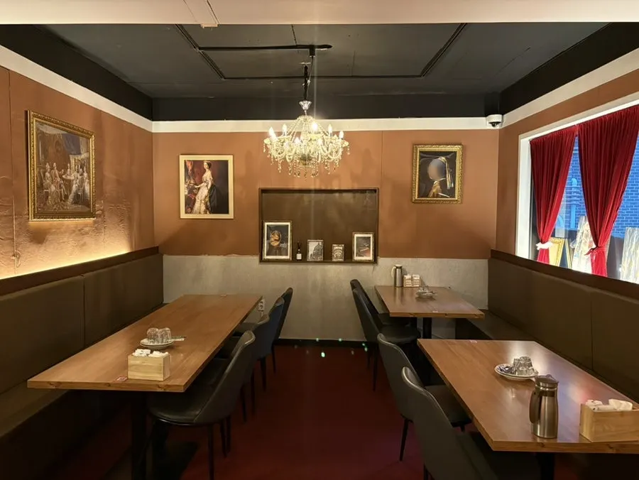 Dining hall decorated with classic furniture and props