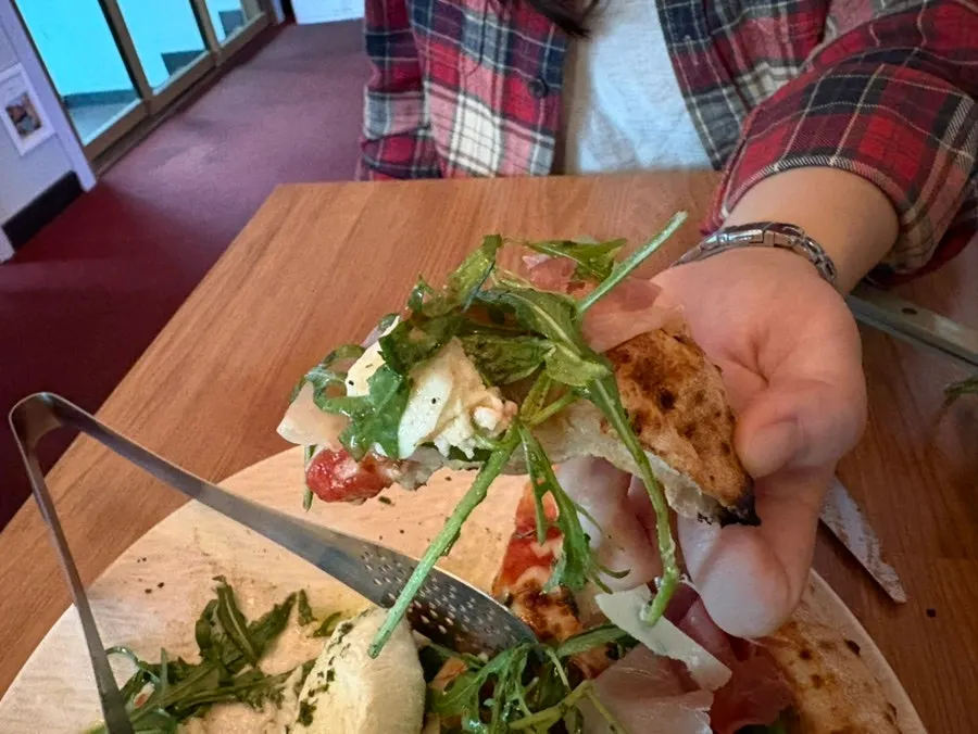 Close-up of the wood-fired pizza crust edge