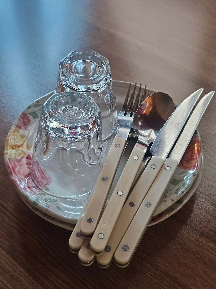 Plates and cutlery set on a table
