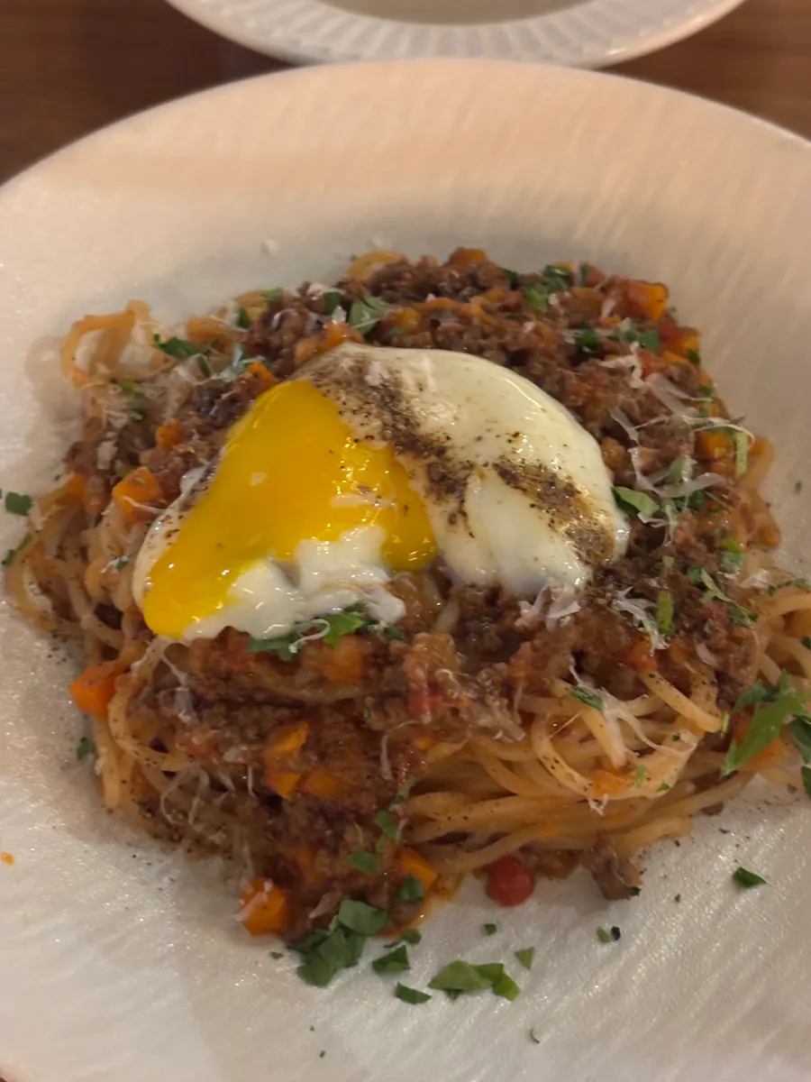 Fresh pasta mixed with beef ragu sauce