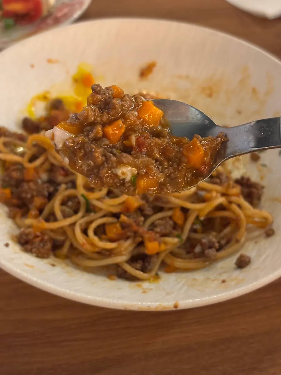 Pasta plate scraped clean of ragu sauce