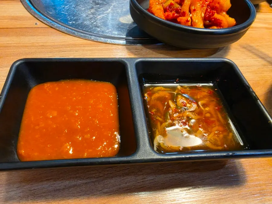 Chive salad and dried radish strips among the side dishes