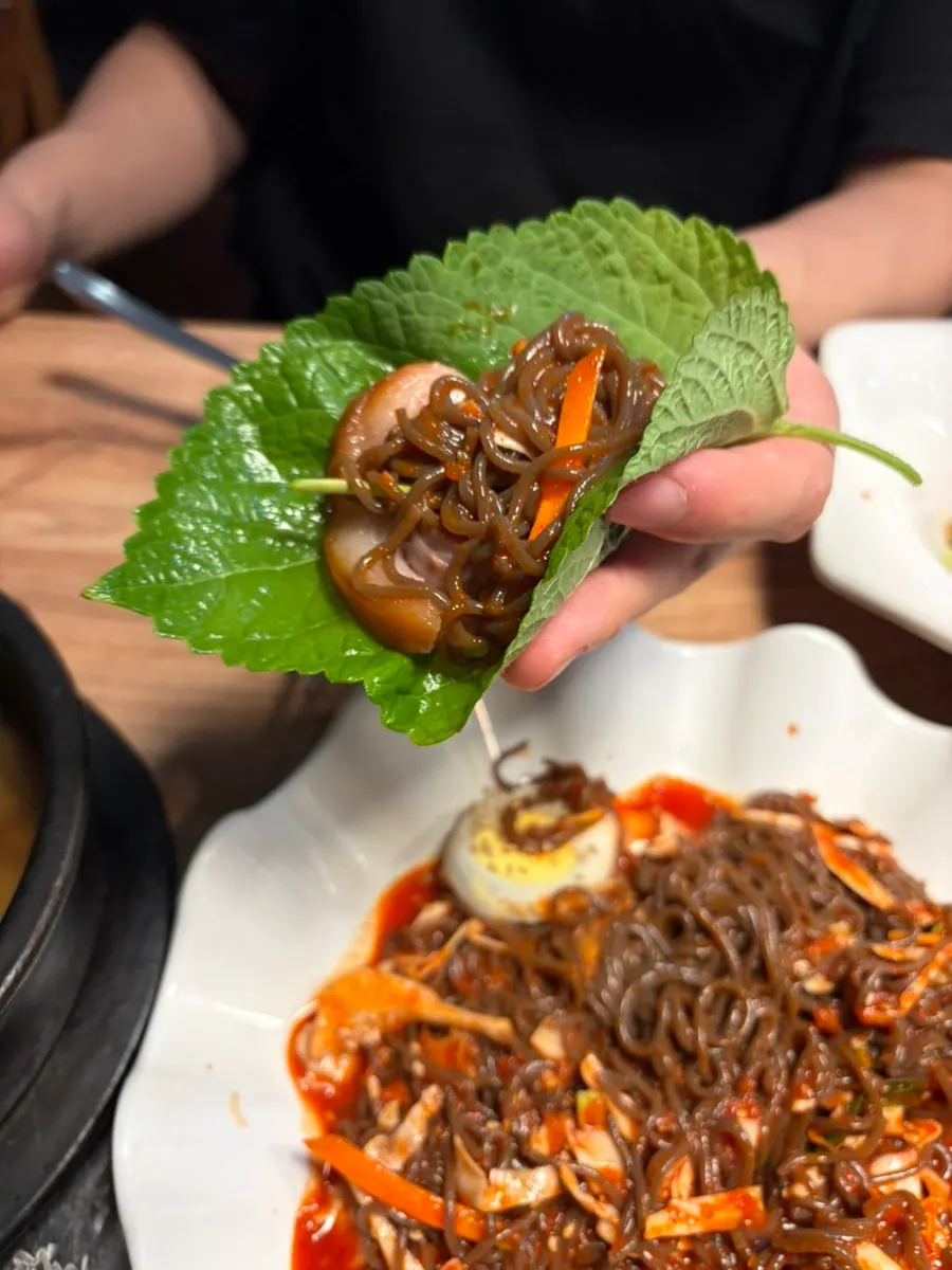 Jokbal wrapped in a perilla leaf