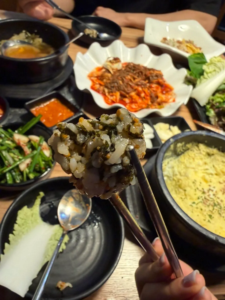 Table full of jokbal and side dishes
