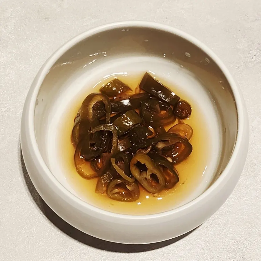 Spicy pickled peppers served as a basic side dish