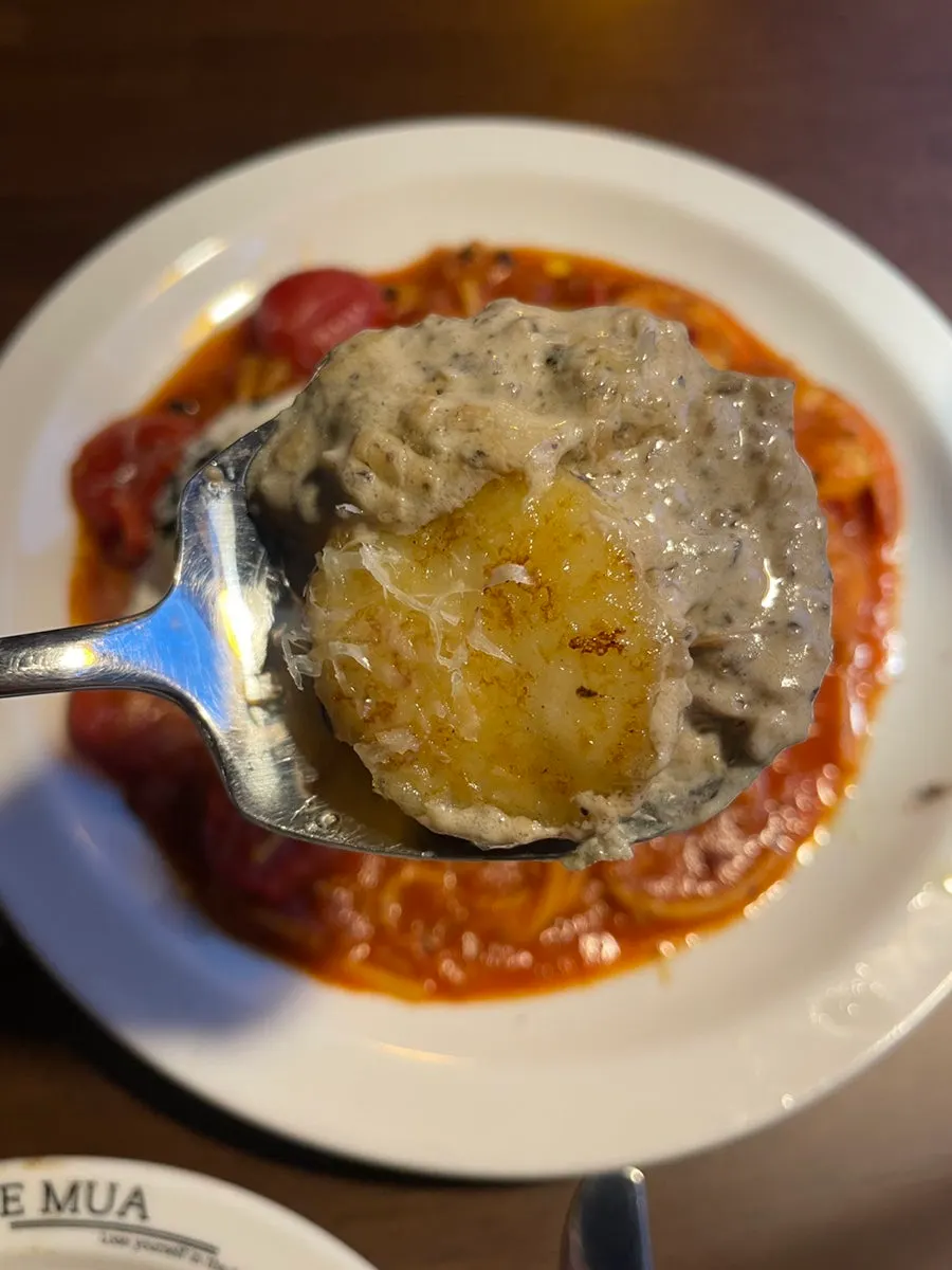 Cross-section of the gnocchi, browned on the outside