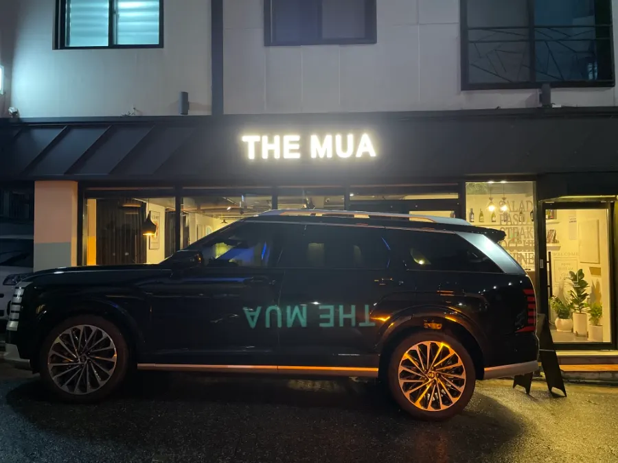 Entrance and sign of THE MUA