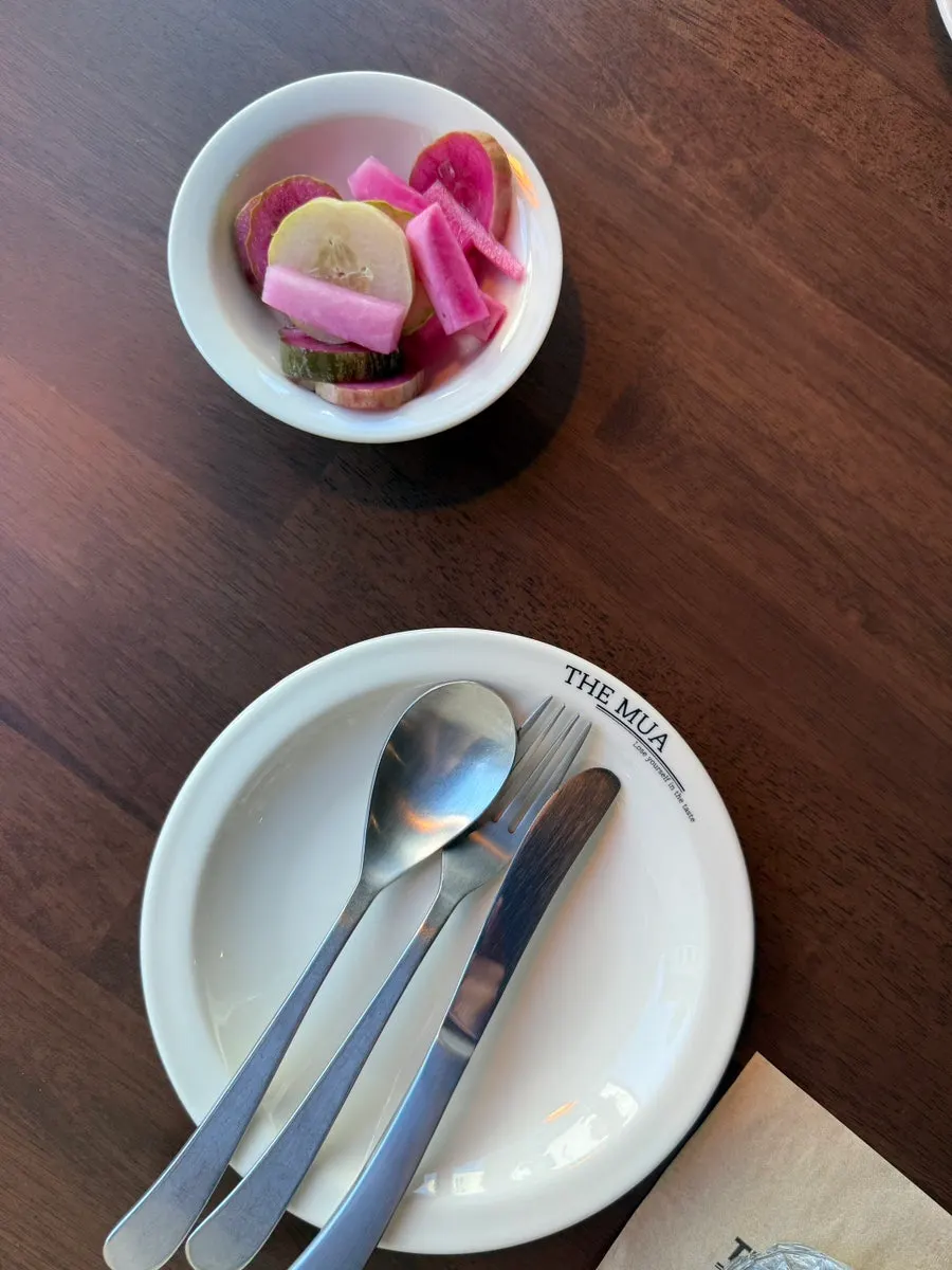 Water glass and tableware under table lighting