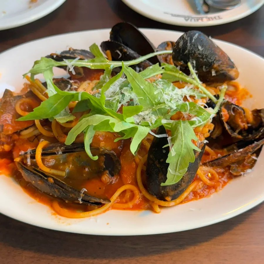 Close-up of the smoky mare pasta's rich tomato sauce
