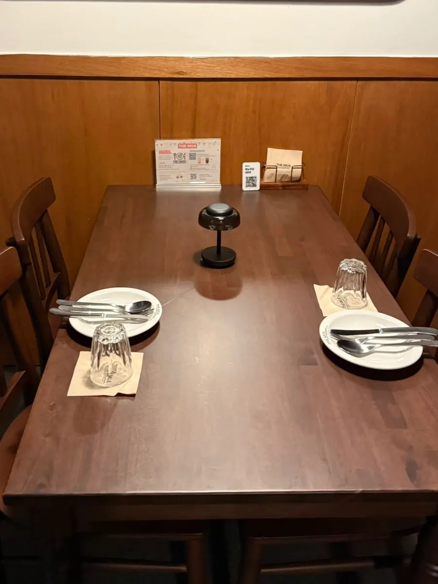 Dining hall seating and atmosphere at THE MUA