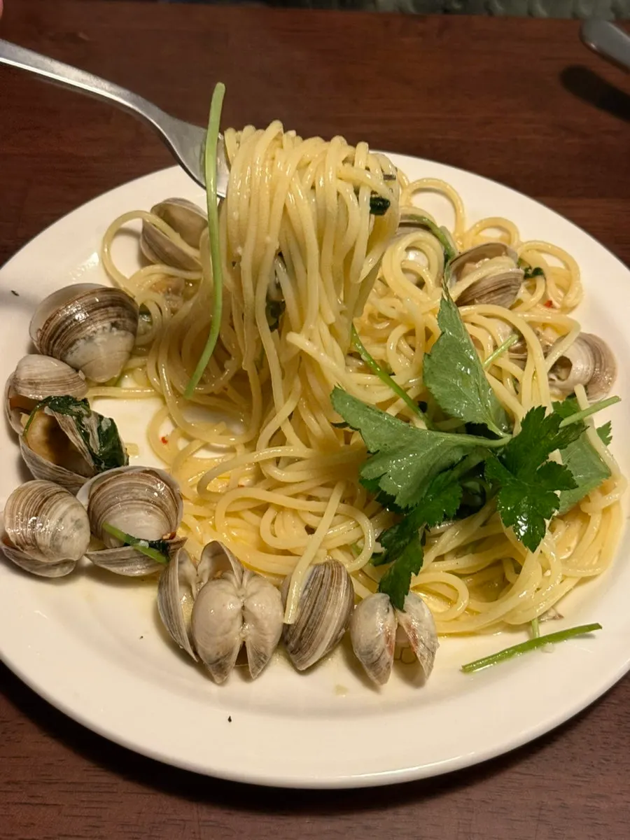 Minari clam pasta topped with surf clams
