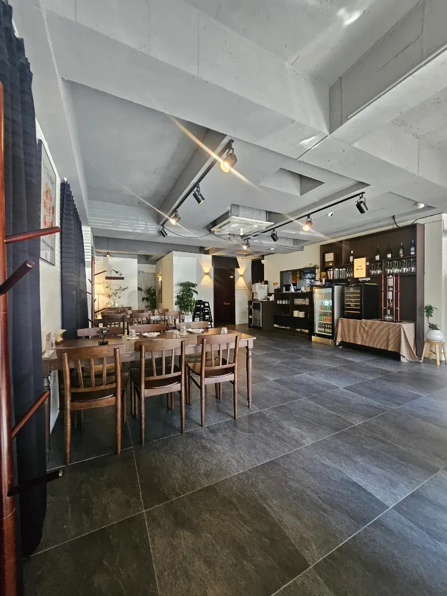 Menu board and table setting at THE MUA