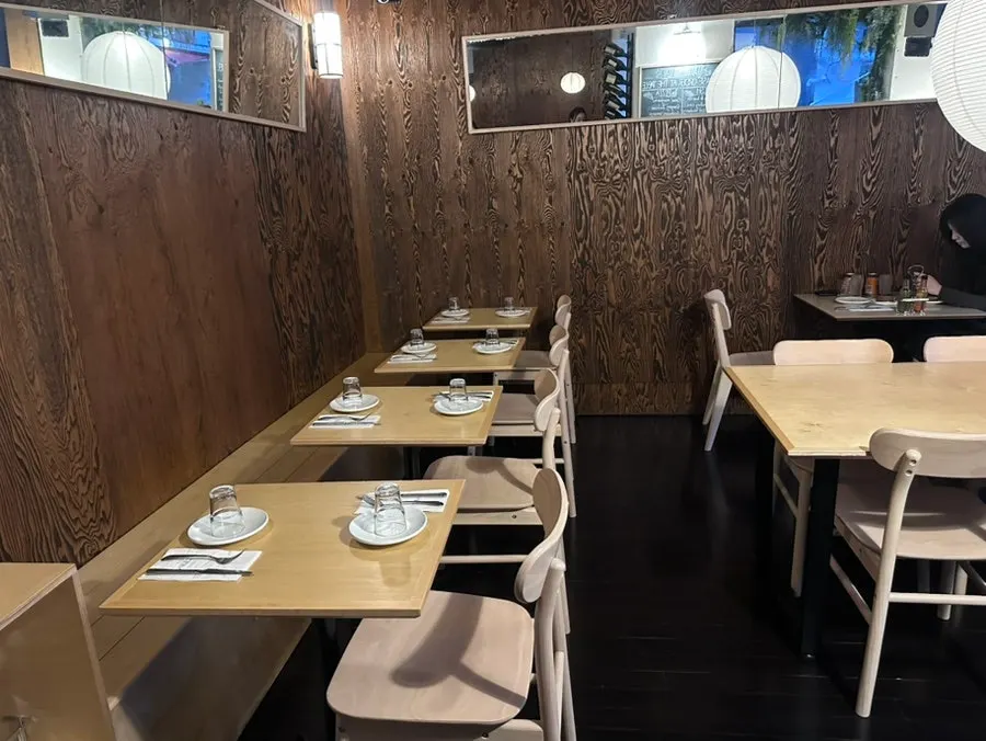 Entrance of TPM hbc with outdoor tables