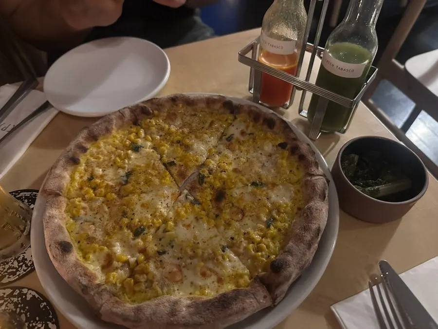Cross-section of the pizza eaten plain, without toppings