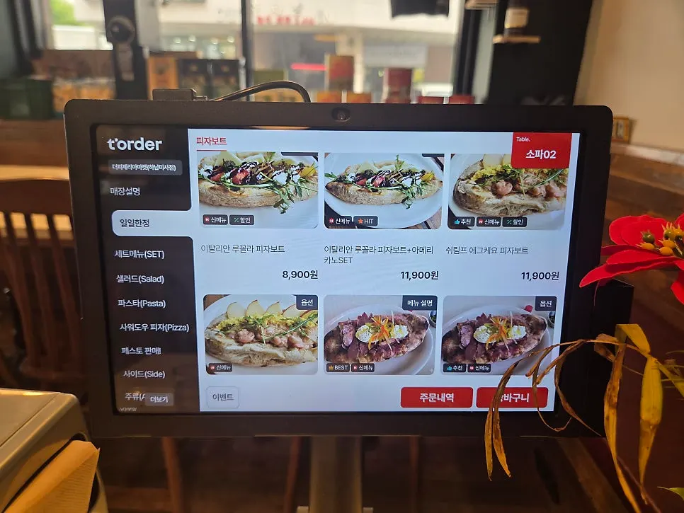 Menu page listing pizza boats and pastas