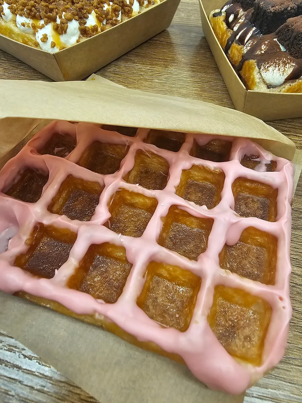 Strawberry chocolate waffle picked by the child
